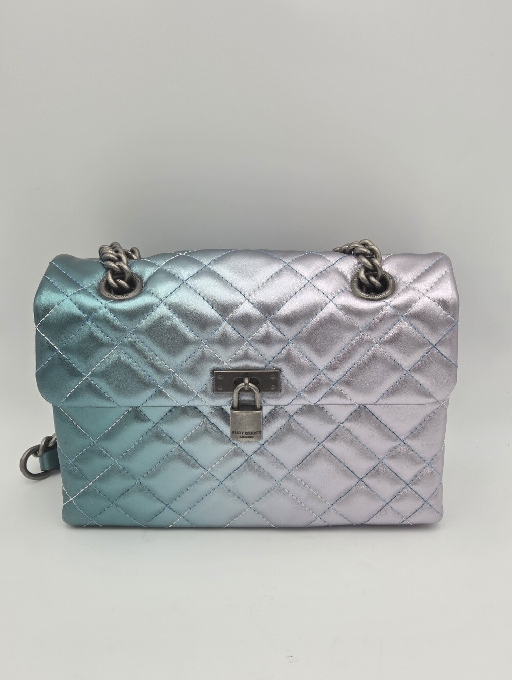 Kurt Geiger London Brixton Lock shoulder bag featuring a quilted metallic ombré